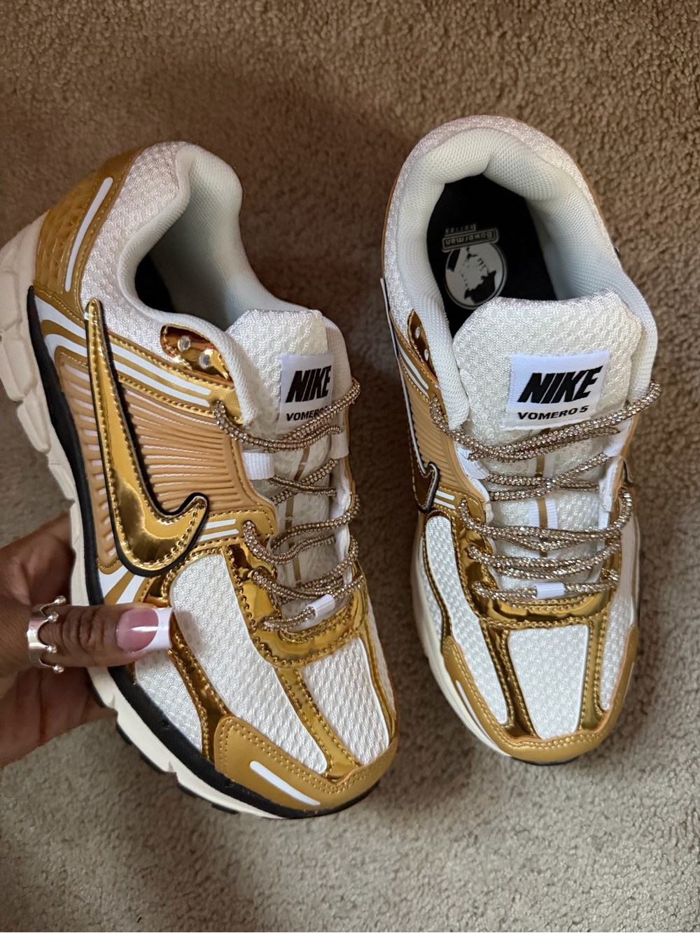 Gold Nike Vomeros